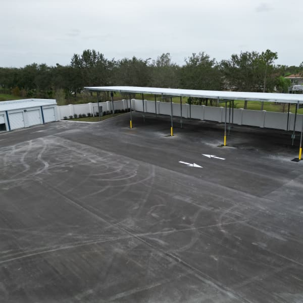 Covered RV, boat, and auto parking at StorQuest Self Storage in Parrish, Florida