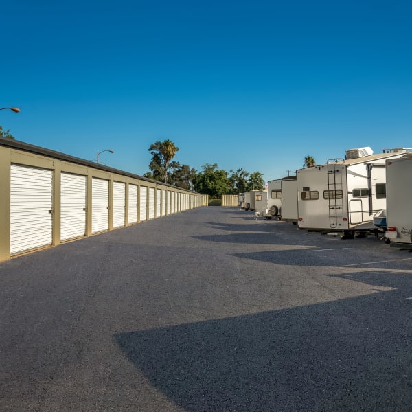 Drive-up storage units and RV parking at StorQuest Self Storage in Acampo, California