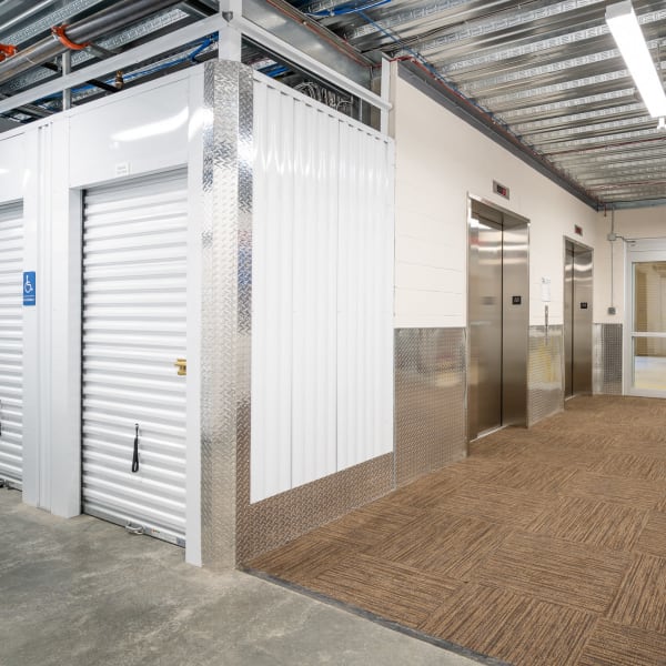 White doors on indoor units at StorQuest Self Storage in West Babylon, New York