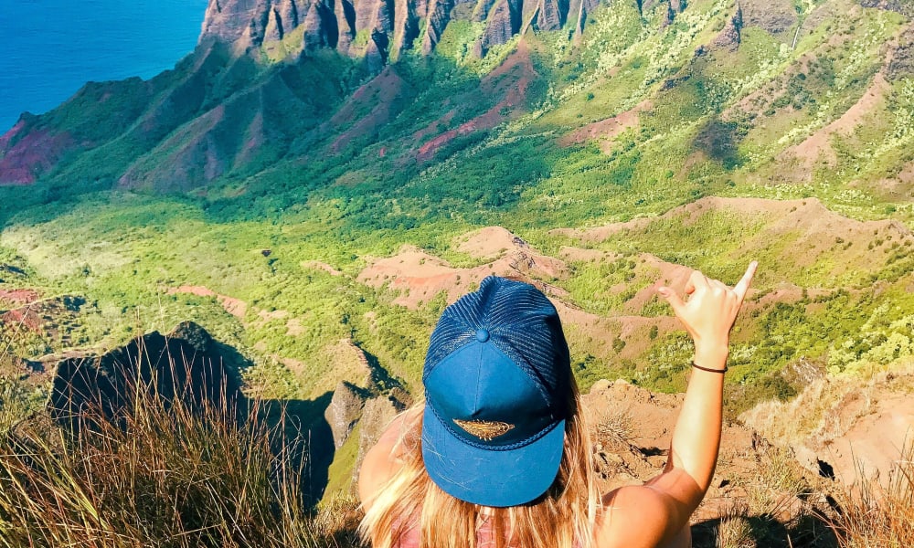 Woman on a ridge in Hawaii for StorQuest Self Storage's partnership with Hawaiian Legacy Reforestation