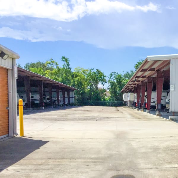 Covered RV and boat parking at StorQuest Self Storage in Friendswood, Texas