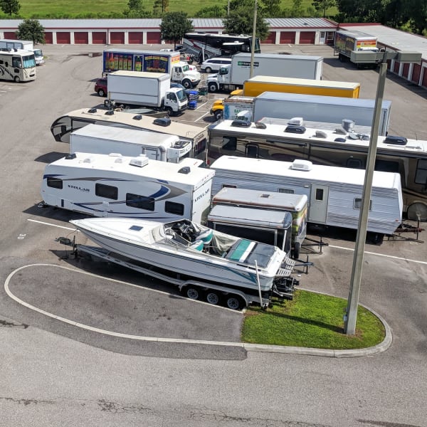 RVs, boats, trucks, and trailers parked at StorQuest Self Storage in Temecula, California