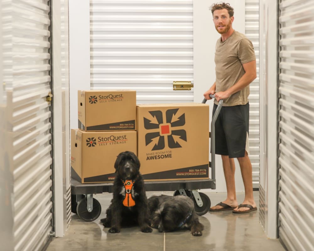 Jordan Kahana moving boxes at StorQuest Self Storage in Santa Monica, California