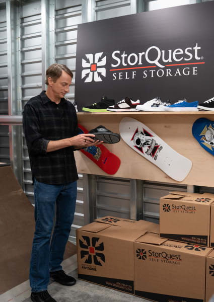 Tony Hawk shows off some cool shoes at StorQuest Self Storage