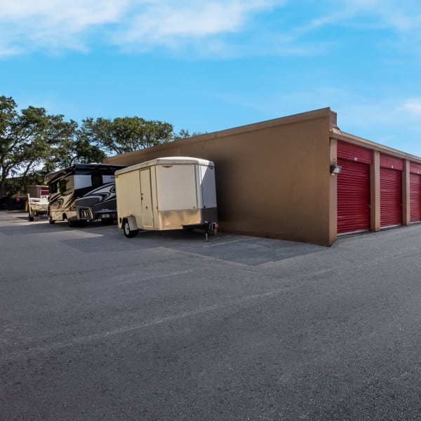 RVs, boats, and trucks parked at StorQuest Self Storage in Sarasota, Florida