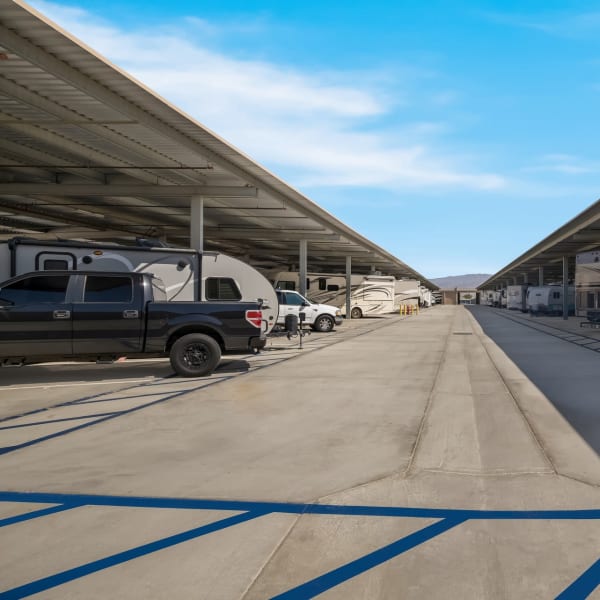 Covered RV, boat, and auto parking at StorQuest RV/Boat and Self Storage in Indio, CA
